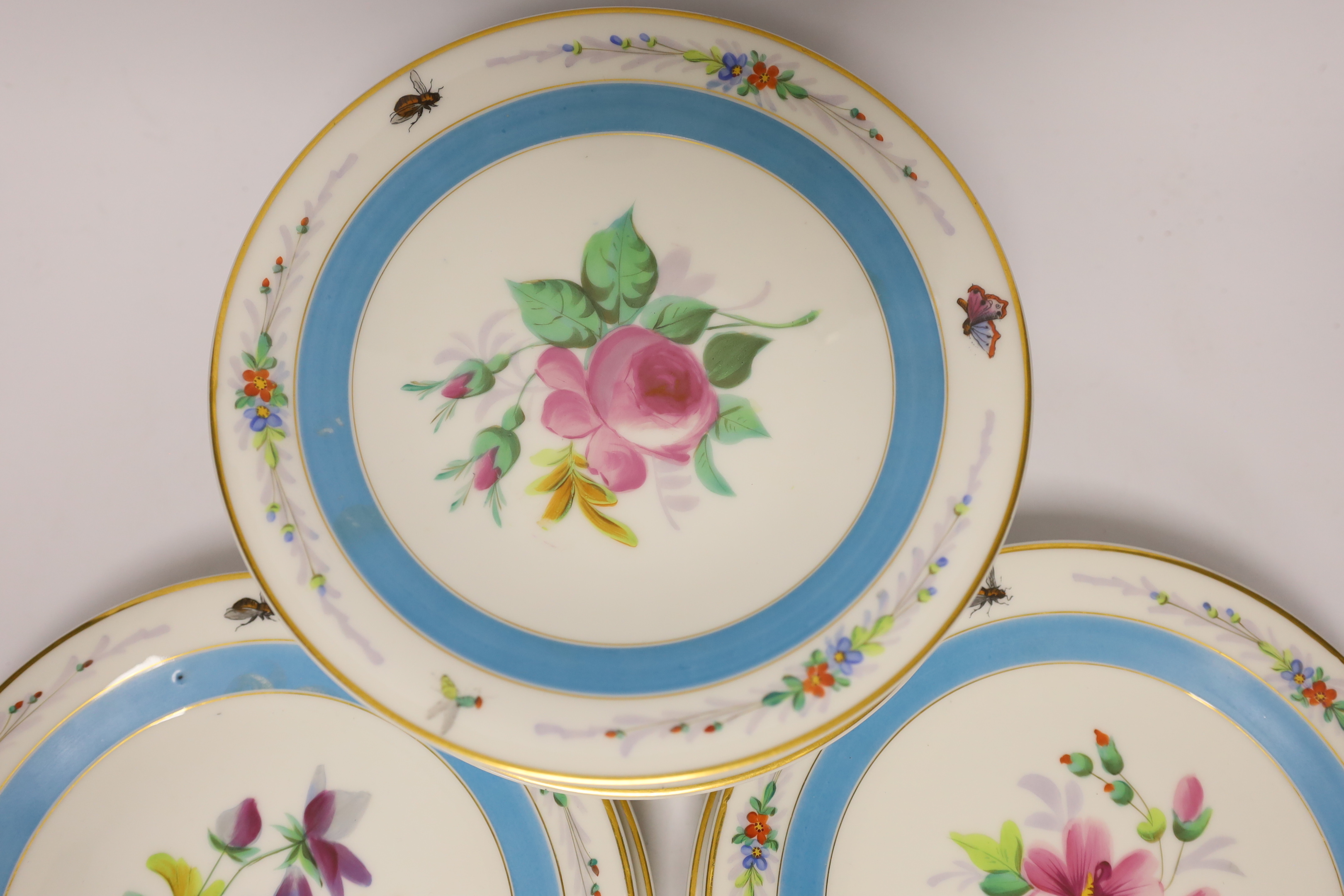 A French mid 19th century floral dessert set, with six plates and two pedestal dishes